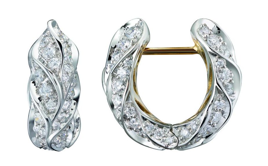 Kat Florence ear huggies in platinum with 2.11 carats of D-flawless diamonds and an 18-karat yellow gold inner gallery.