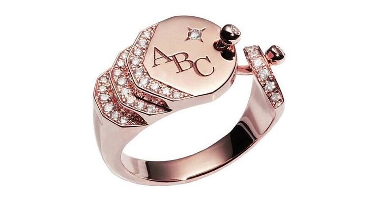 Nouvel Heritage gold and diamond signet rings can be personalized with initials