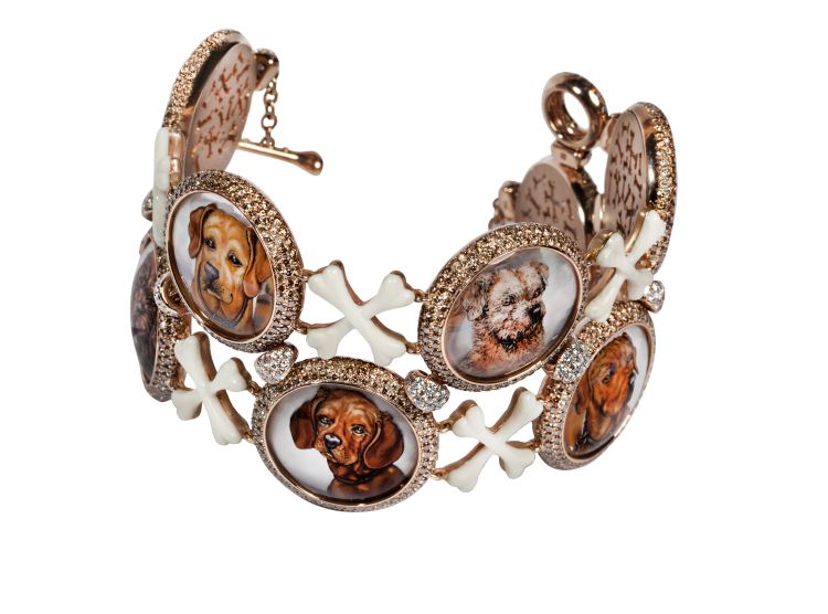 Year of the Dog Suzanne Syz cuff with images of the jeweler’s dogs