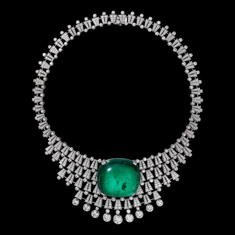 18-karat white gold diamond necklace/tiara centrally set with 140.21 carats of cushion-shaped cabochon Colombian emerald. credit Cartier 
