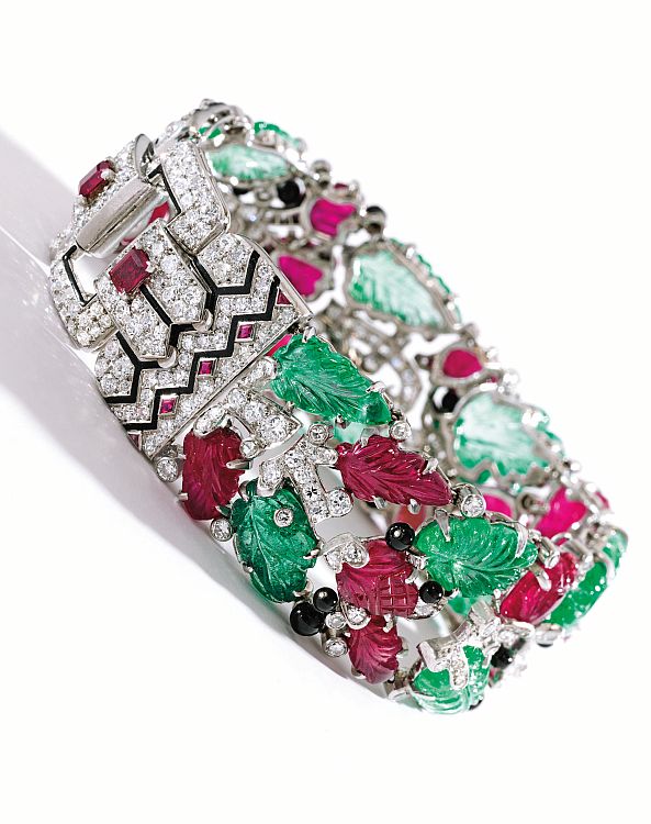 Iconic platinum, colored gemstone, diamond and enamel tutti frutti bracelet by Cartier, New York, circa 1928, sold for $2,165,000 at Sotheby’s New York in 2014