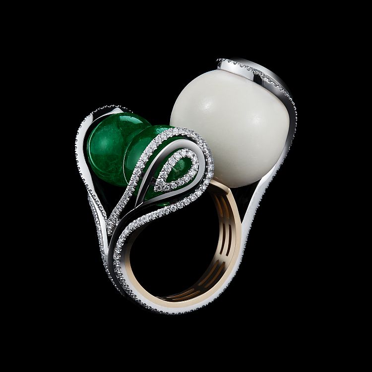 Alexandra Mor one-of-a-kind ring featuring two Colombian emerald beads from the Muzo mine totaling 18.15 carats and a 16.80-carat wild tagua bead. 