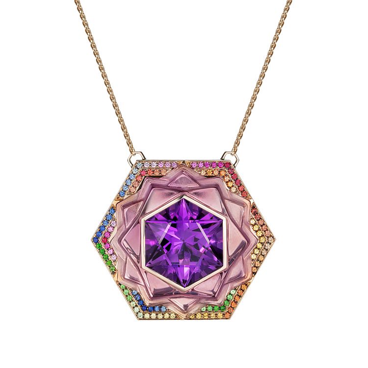 Best in Colored Gemstones Below $20,000: Noor Fares
Linked to the crown chakra through its lotus shape and related gemstones, this 18-karat grey-gold Sahasrara bespoke pendant has a carved hexagonal amethyst, colored sapphires, tourmaline, and hand-painted rainbow enamel. 