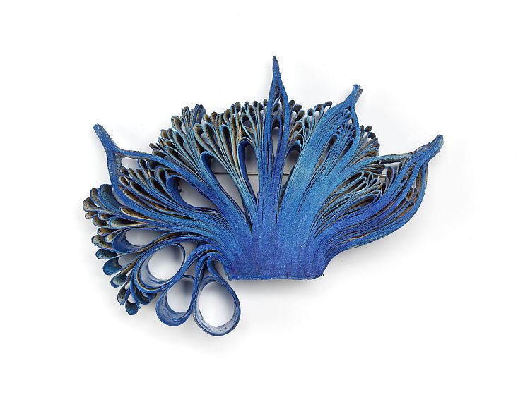 'Blue Seanemone II' brooch, paper on silver frame,  designed and made by Flóra Vági, Hungary, 2016. Image: Victoria and Albert  Museum, London. 