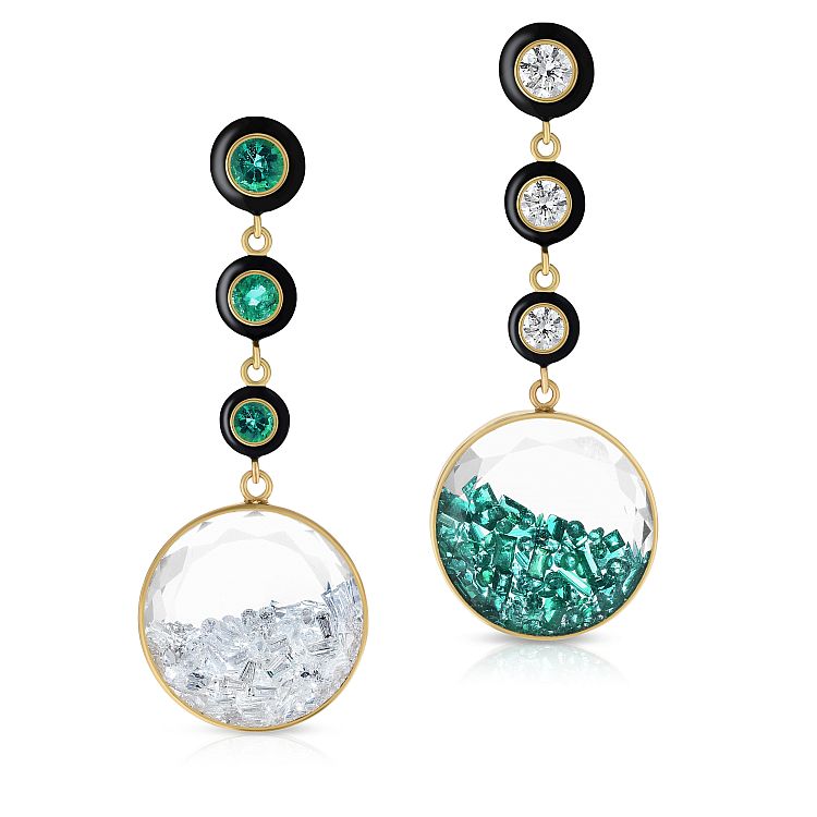 Moritz Glik has trapped an array of tumbling white diamonds and emeralds within sapphire glass in these 18-karat yellow-gold and black enamel earrings