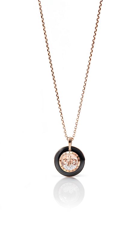 Half a carat of loose diamonds play within a sapphire dome on this 18-karat rose-gold and black ceramic Stars of Africa pendant by Royal Asscher. 