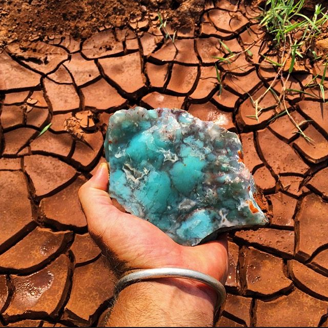 Yianni Melas and the rough aquaprase he found in Africa. 