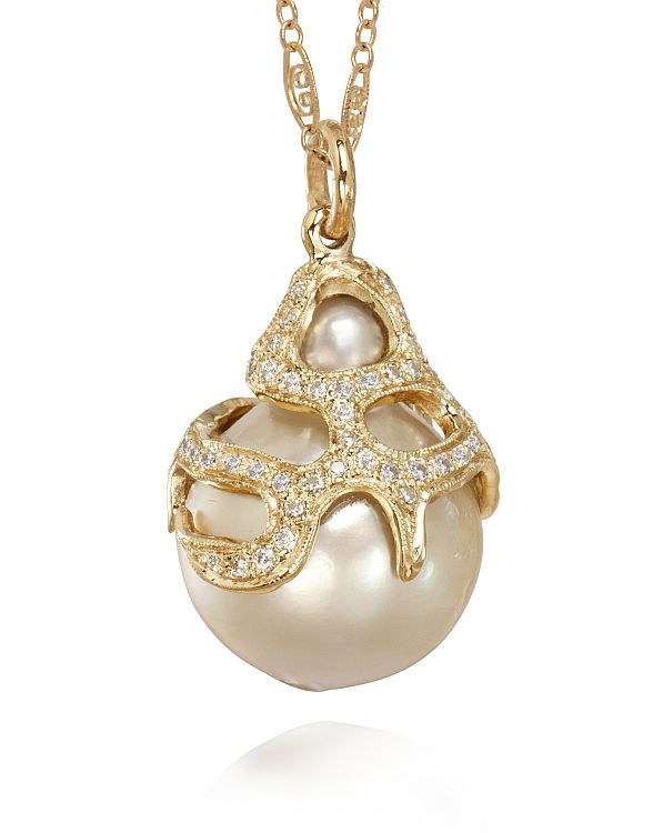 Just Jules South Sea baroque pearl pendant encapsulated by a pave web of diamonds set in 14-karat yellow gold. 