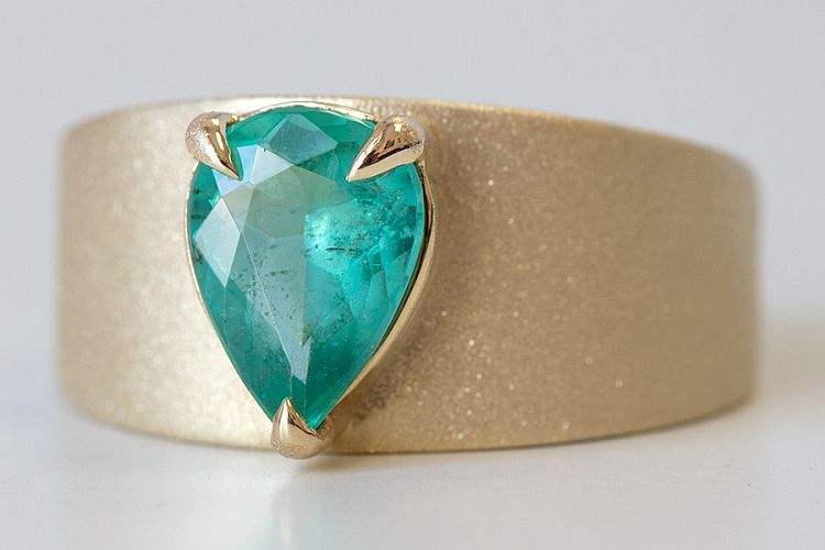 Elizabeth Street Eagle Claw ring in 14-karat gold set with a pear-shaped 1.5-carat emerald. 