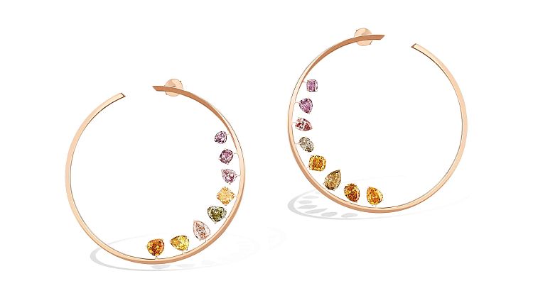 Messika. Colored diamonds characterize these Rainbow Créole hoops in 18-karat rose gold. 