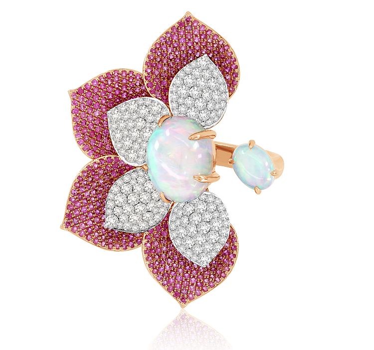 Sutra. The Kashmir ring features pink sapphire and diamond pavé and two white opals in 18-karat rose gold. 