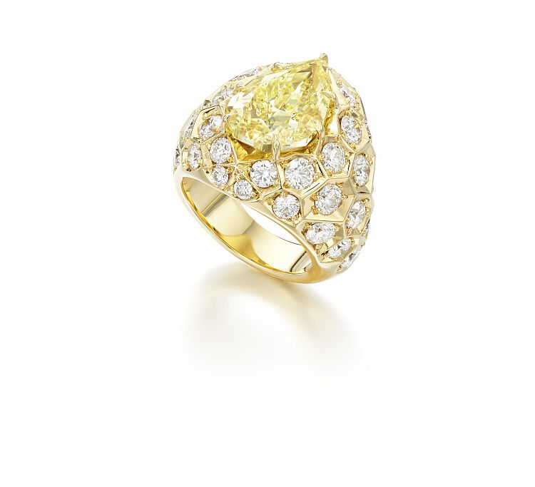 Lily Gabriella for Sotheby's Diamonds. Honeycomb 18-karat yellow gold ring set with a pear-shaped, 6.12-carat, fancy-intense-yellow diamond with full cut white diamonds. 