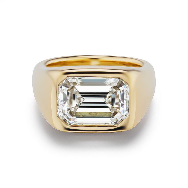 Brent Neale gypsy ring with emerald cut diamond in yellow gold. 