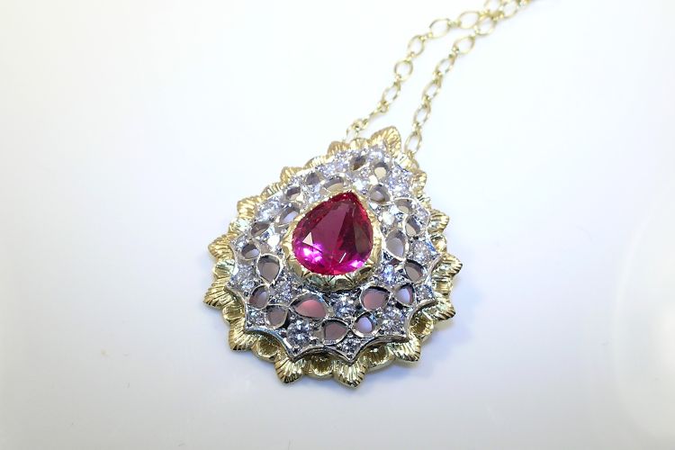 Cynthia Scott Jewelry.18-karat gold and diamond pendant with 2.64 carats of Mahenge spinel.