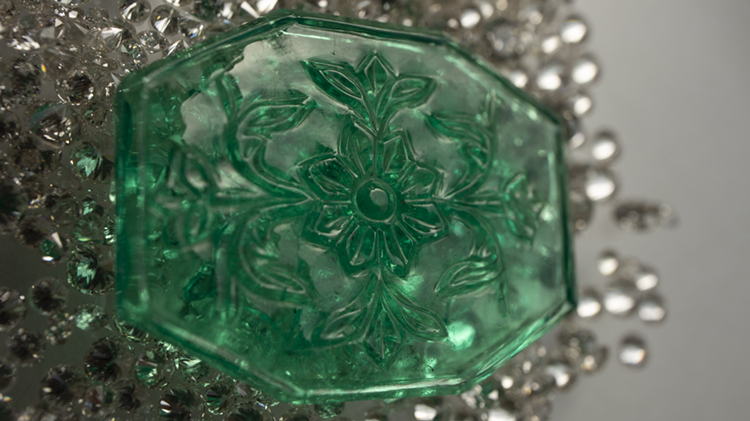 Tank Fine Gems carved Colombian emerald slice on a bed of diamonds. Image: Richa Goyal Sikri.
