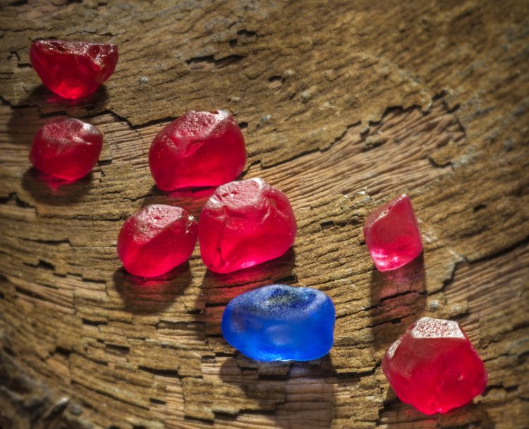Rare Vietnamese cobalt blue spinel amongst some top-grade pinkish-red spinels from Myanmar.
