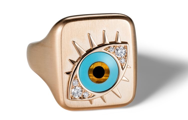 Tabbah Signet ring in 18-karat gold featuring an evil eye decorated with diamonds, turquoise, cat’s eye and onyx.