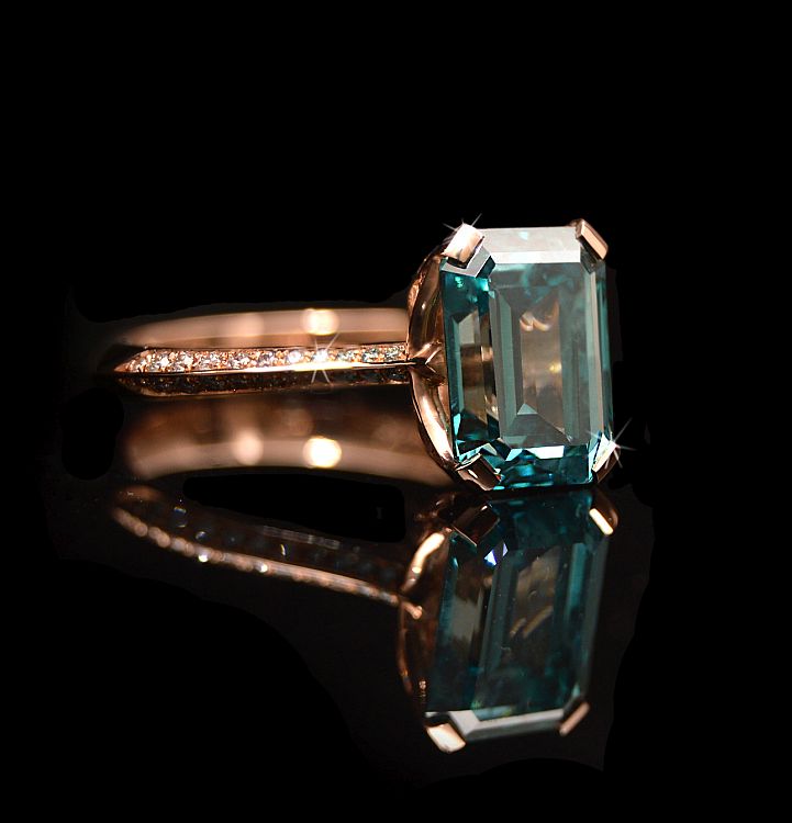 Nigel O'Reilly Aurora engagement ring in 18-karat set with an emerald-cut 3.69-carat blue diamond, with graduated white and pale blue diamonds on the shoulders. Image: Richard Foster. 