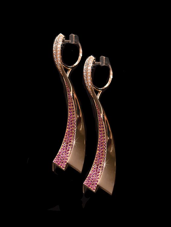 Nigel O'Reilly Comet earrings in 18-karat rose gold with rubies and diamonds. 