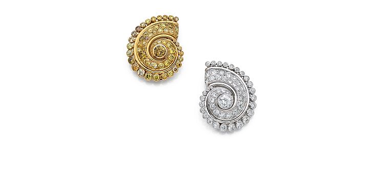 Pair of 'Spire' clips, one in 18-karat white gold and platinum set with a half-cut diamond and brilliant cut diamonds, the second in 18-karat yellow gold set with yellow, brown or madeira diamonds. Circa 1938-39. Hallmark of Groené & Darde, with a certificate from Olivier Baroin. Estimated at EUR 40,000-50,000, it sold for EUR 105,920.  Image: Artcurial. 