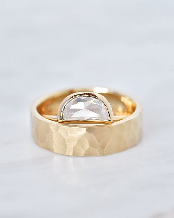 Valerie Madison textured gold band set with a half-moon diamond. 