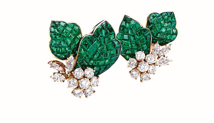 Van Cleef & Arpels mystery set earrings in emeralds and diamonds. Image: Joseph Saidian & Sons. 