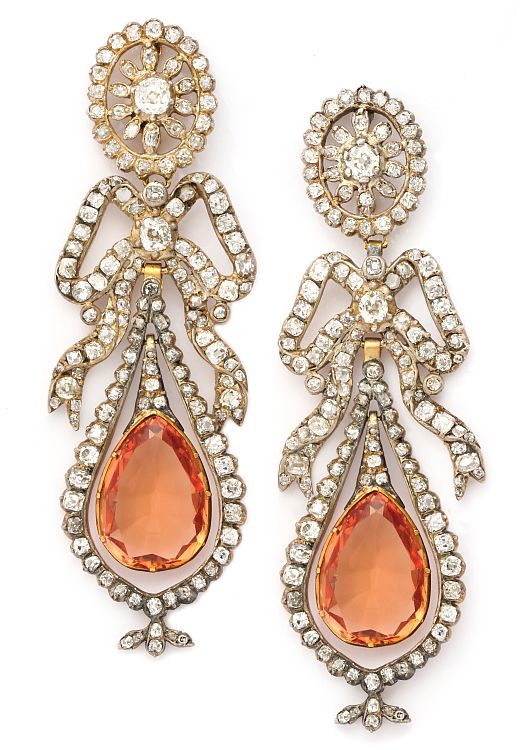 Articulated Victorian pendant earrings set in silver and gold with old-mine diamonds and suspended pear-shaped Imperial topaz centers. England, ca. 1870. Photo: ALVR