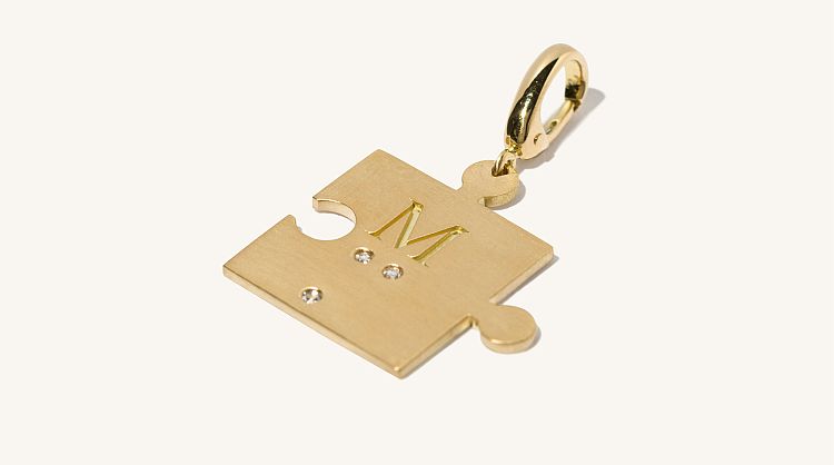 Milamore Puzzle pendant in 18-karat gold with diamonds. 