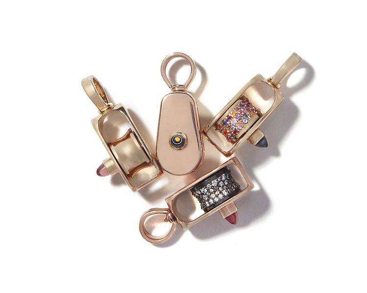 Marla Aaron fully functional Pulley charms in 14-karat gold with diamond and gemstone pavé, and cabochon gems on the side.