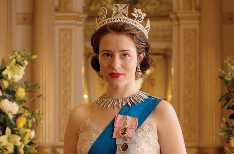 Actress Claire Foy portraying the young Queen Elizabeth II, wearing replicas of the George IV diadem and Order of the Garter insignia.