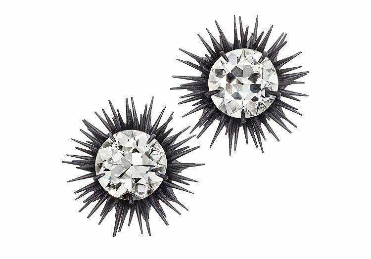Hemmerle Earrings, 2016. 
Diamonds (5.47 and 5.02ct) in blackened iron and white gold, Private collection. Picture credit: Courtesy Hemmerle 