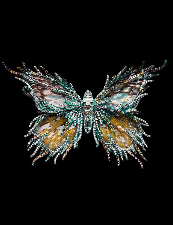 Forever Dancing — Bright Star Brooch by Wallace Chan with colored diamonds, crystal, mother-of-pearl, titanium, and butterfly specimen, 2013. Photo: Wallace Chan.
