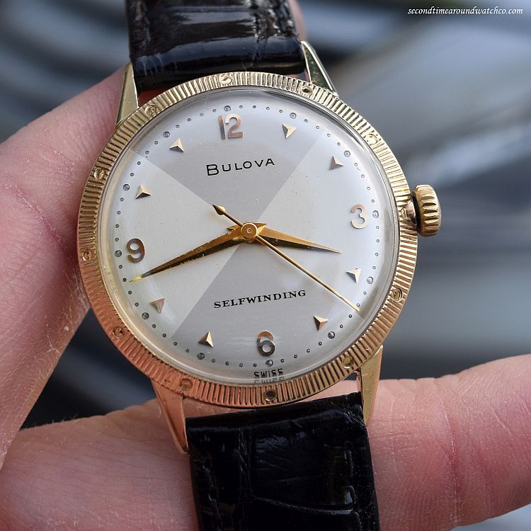 - 1955 Vintage Bulova Automatic 10k Yellow Gold Filled watch with Unique Two Tone Gray & Silver Dial with Applied Gold Color Arabic 3, 6, 9, and 12 and Beveled Triangle Markers