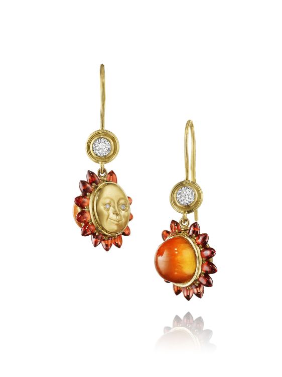 Anthony Lent Sunset earrings in 18-karat yellow gold with garnets
and diamonds.
