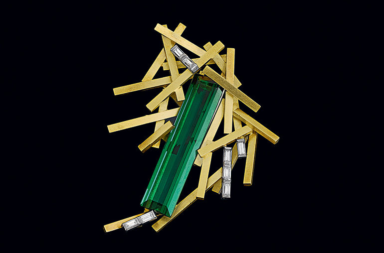 Andrew Grima brooch with yellow gold "matchsticks" green tourmaline and diamonds. Photo: Grima Archives
