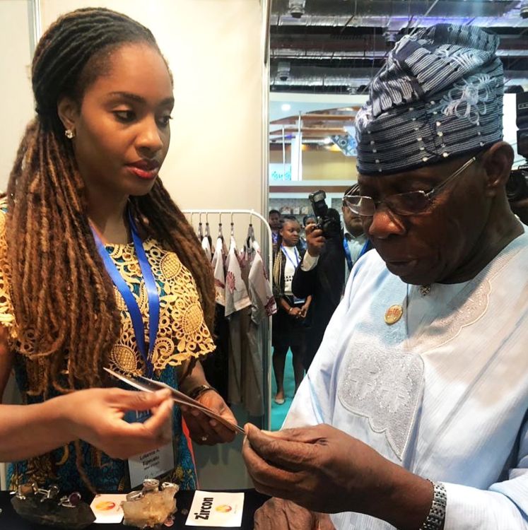 At a pan-African trade show in Egypt, President Obasanjo of Nigeria discussed the development of the Nigerian gem industry with Amina.