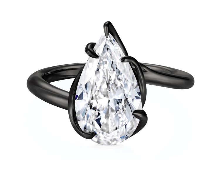 Thelma West Rebel Black ring in 18-karat gold and ceramic with pear-cut diamond center.