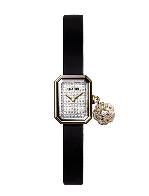 Chanel Première Extrait de Camélia quartz watch in 18-karat yellow gold with a diamond dial and a gold and diamond charm.