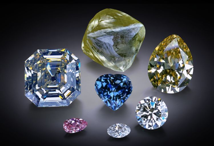 Smithsonian diamonds! The  253.7-carat Oppenheimer Diamond crystal (top) with the 30.62-carat Blue Heart Diamond (center), surrounded by a selection of faceted diamonds in the Smithsonian National Gem Collection. Image: Chip Clark, Smithsonian Institution, enhanced by SquareMoose Inc.