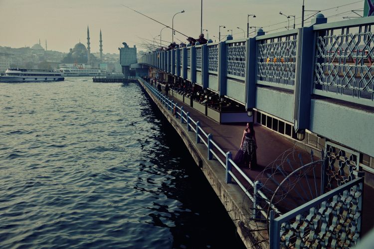 Fatma Altınbaş on the Galata Bridge, the oldest of the three structures cutting across the Golden Horn. Photo: Rizzoli New York. 