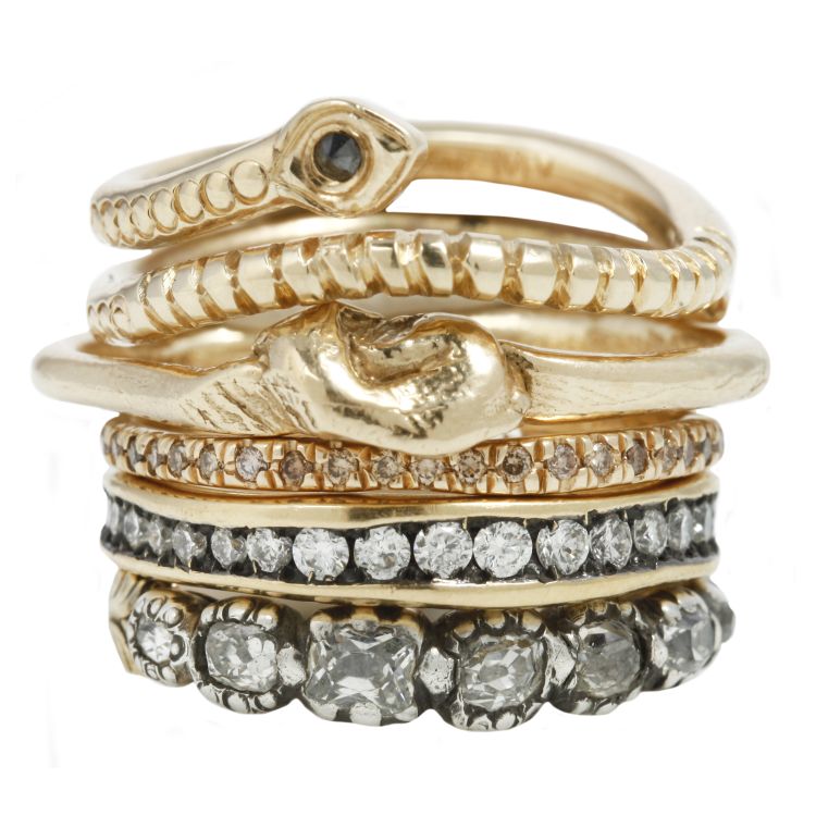 Esqueleto ring stack from top to bottom:
Maiden Voyage 14K gold serpent band with black diamond
Nan Collymore 14K gold knot ring
Lauren Wolf Jewelry pavé white diamonds eternity band set in 18k yellow gold
Satomi Kawakita eternity white diamonds Absolute band in 18K yellow gold
Vintage Georgian era seven-diamond band with silver setting and engraved gold shank
