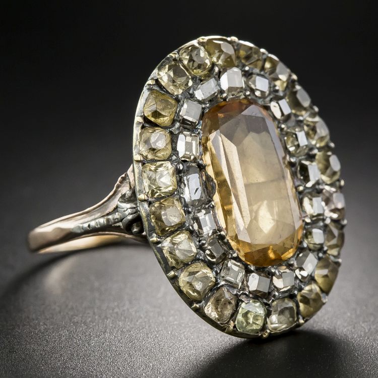 Georgian ring in 9-karat rose gold set with a golden topaz and light brown diamonds from Lang Antiques. 