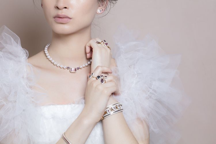 Model wearing the Princess Bride necklace in pearls, tourmalines and sapphires. Photo: Liz Lippman. 