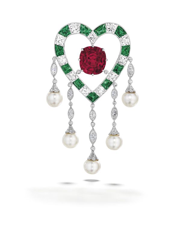 The DuPont Ruby brooch with an 11.20-carat ruby, emeralds, pearls, and diamonds sold for over $8.9 million at Christie’s New York in December 2019. Photo: Christie's. 