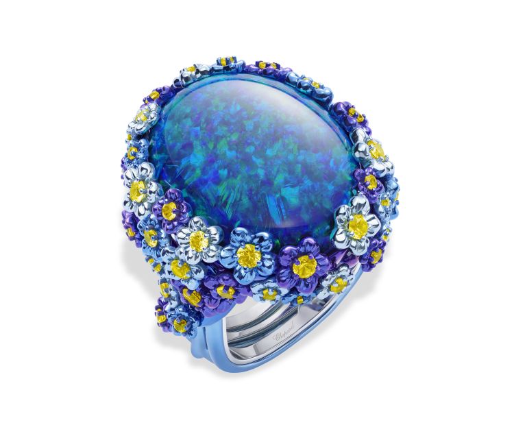 Chopard Red Carpet collection Floral ring in ethical Fairmined-certified 18-karat white gold and titanium featuring a 26.43-carat black opal cabochon and 1.45 carats of round-shaped yellow sapphires. 