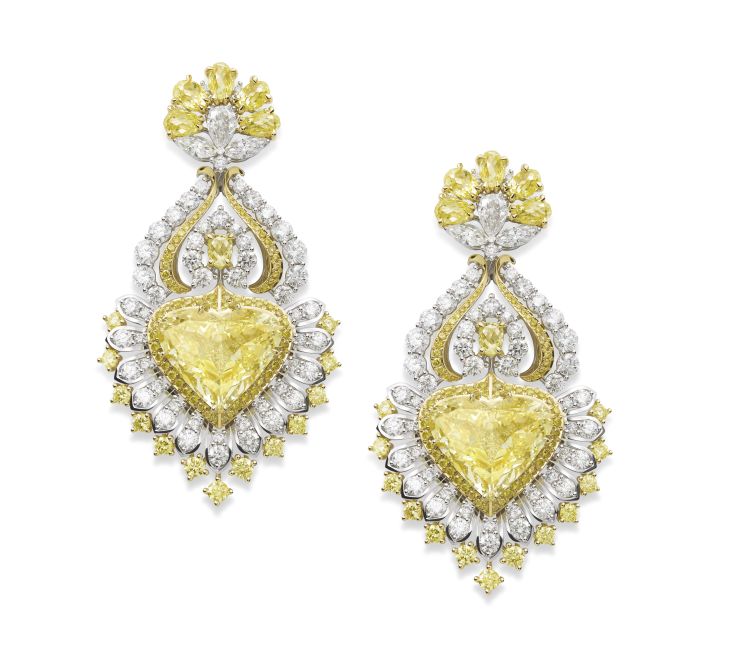 Chopard Red Carpet collection Earrings in ethical Fairmined-certified 18-karat white gold and titanium set with two heart-shaped yellow diamonds, and yellow and white diamonds of various cuts.