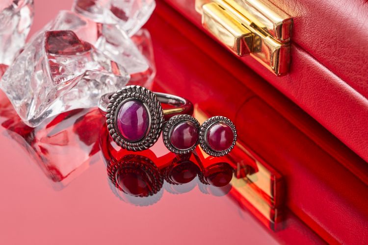 Hartmann’s ring and earrings in 18-karat, rhodium-plated white gold with Greenland ruby cabochons. Photo: Hartmann's. 