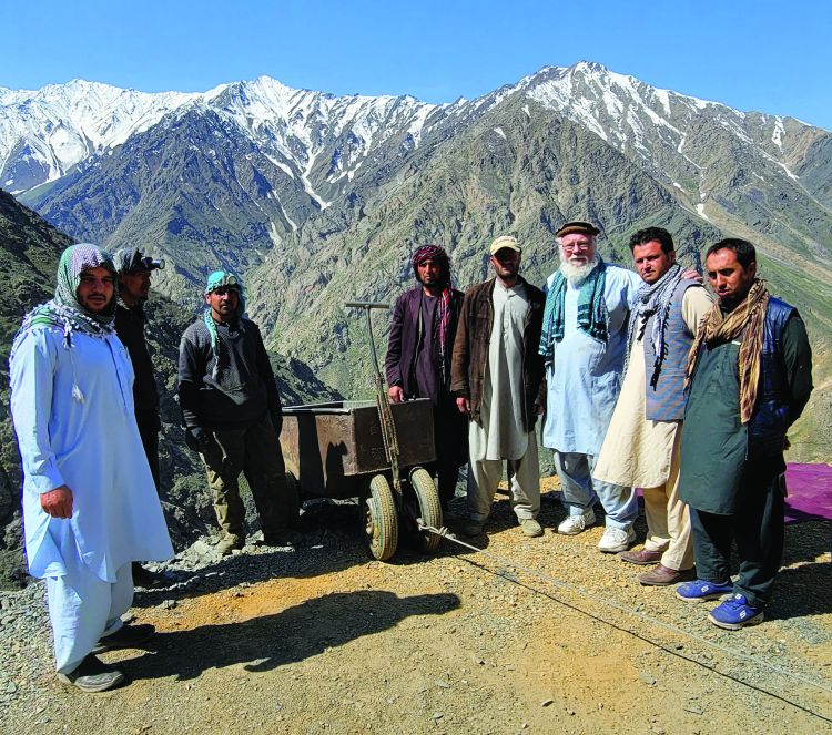 Afghanistan’s emeralds are found in the Panjshir Valley. Gary Bowersox (third from right) has been working with Afghan miners for four decades to help them sell their gems. Photo: Gary Bowersox. 