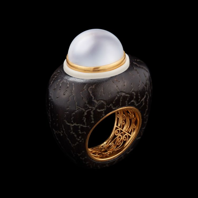 Alexandra Mor Majestic ring with white pearl, tagua seed, and carved ebony.