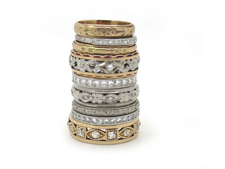 Stack of antique and vintage wedding bands with diamond accents in all karats of gold and in platinum. Photo: The Gold Hatpin. 